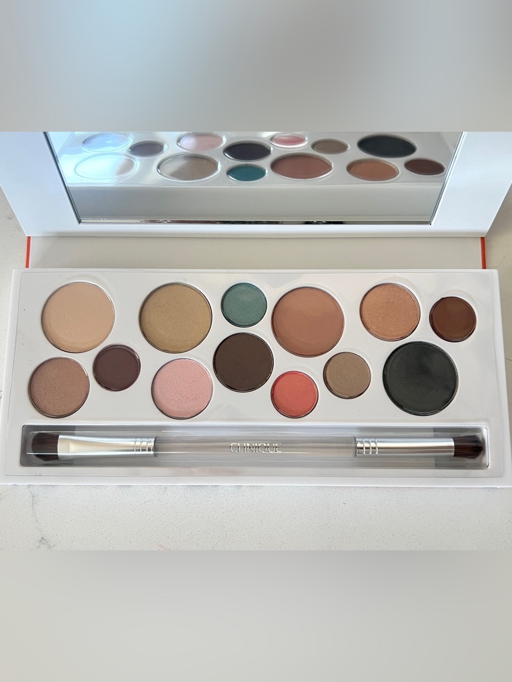 Clinique Eyeshadow Palette in Peach, Pink, Teal, Brown & Gold Tones
